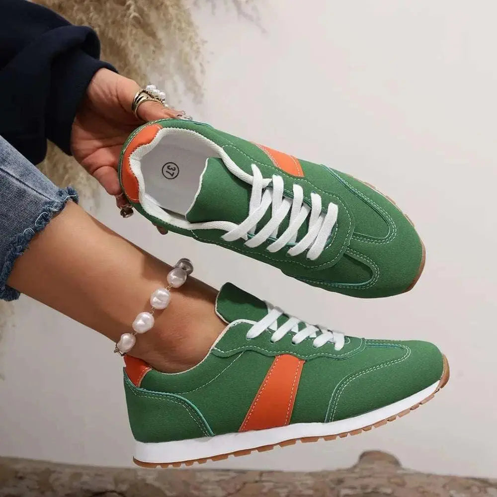 PU leather contrast round toe flats sneakers in green with orange accents.