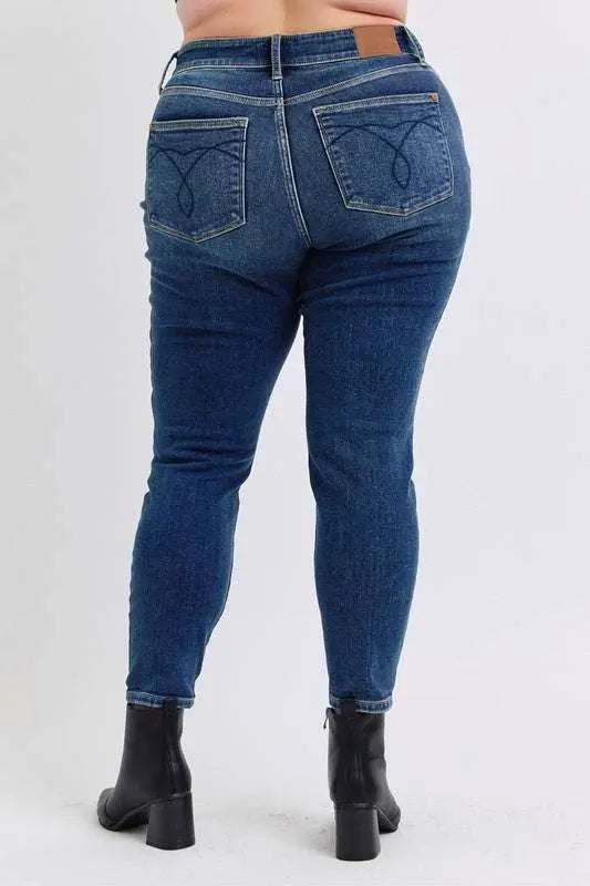 Judy Blue mid-rise skinny jeans with thermal lining, back view.