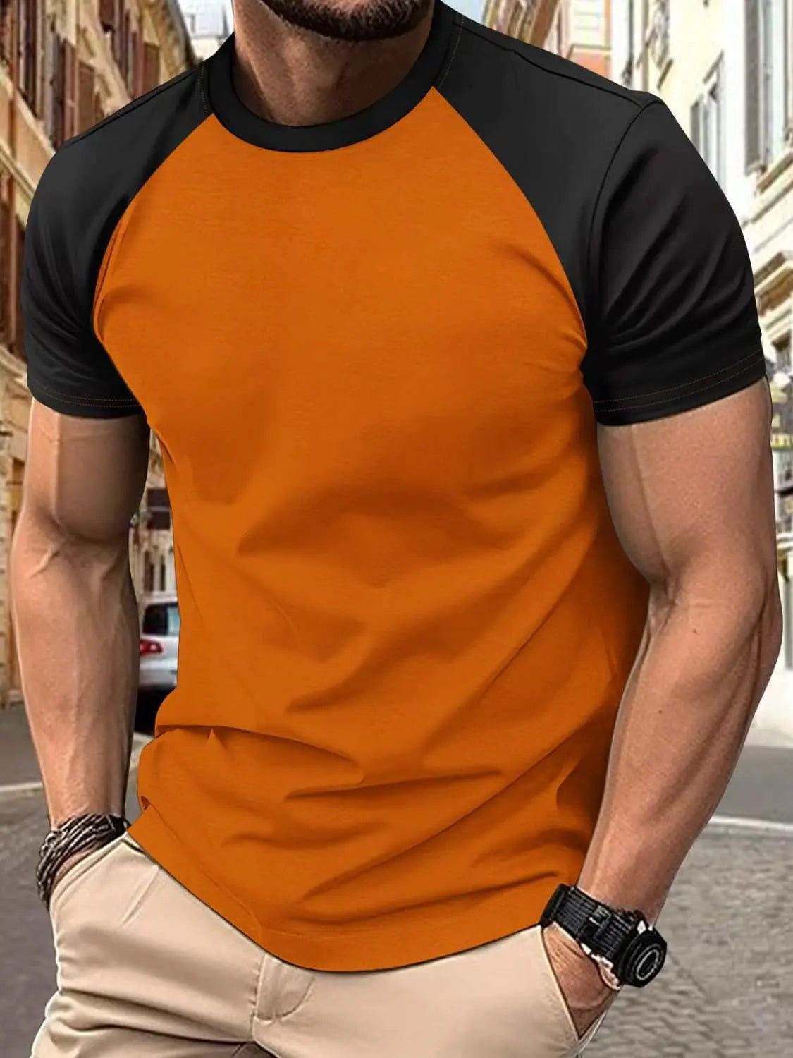 Men's full size round neck contrast T-shirt in orange and black, slightly stretchy polyester and cotton blend.