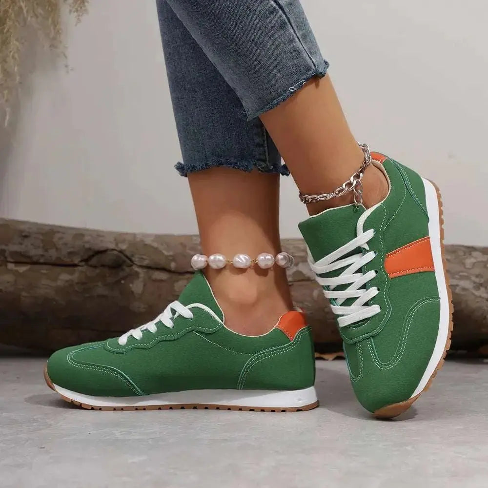 PU leather contrast round toe flats sneakers in green with orange accents.