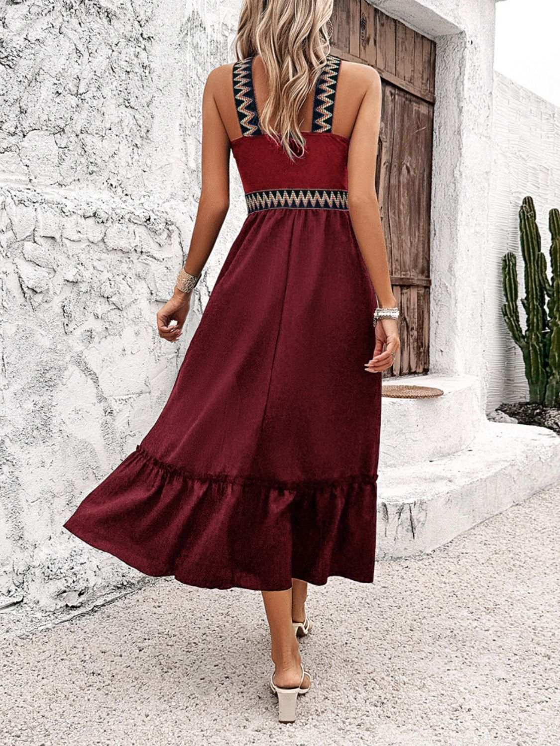 Devine Ruffled Slit Sleeveless Midi Dress in burgundy with ruffle details and slit, made of polyester and elastane.