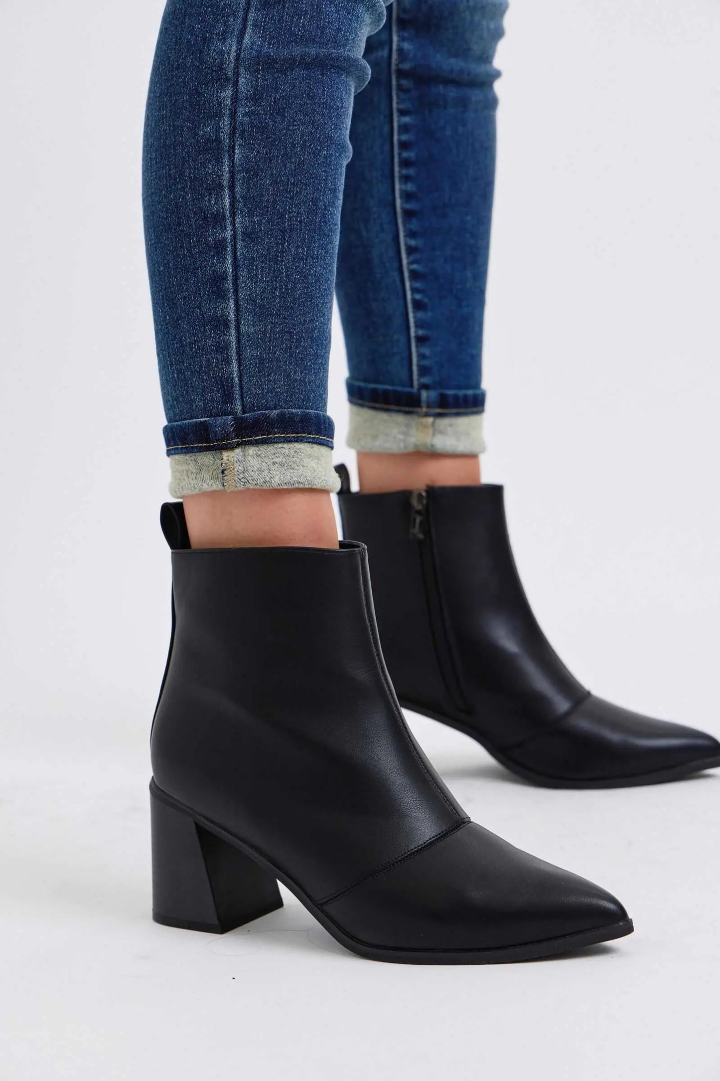 Judy Blue mid-rise skinny jeans with thermal lining and black ankle boots.