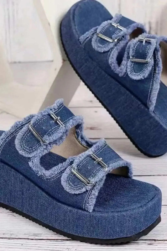 Raw Hem Wedge Buckle Sandals with mid heels in rubber and cloth.