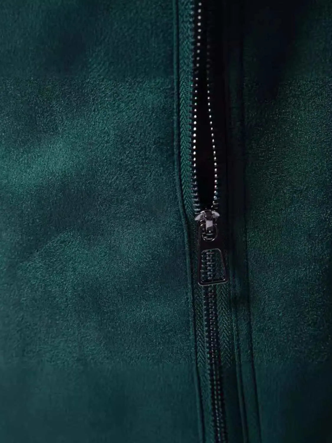 Close-up of green zipper detail on Men's Zip Up Long Sleeve Biker Jacket made of 100% polyester.