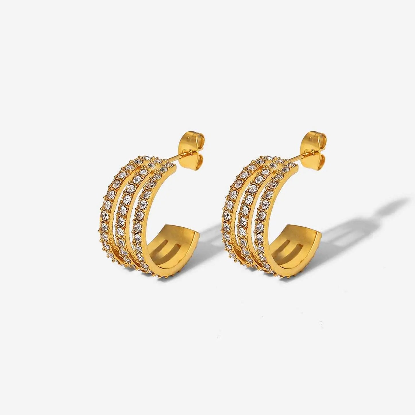 Stainless steel inlaid zircon C-hoop earrings, gold-plated, elegant design.