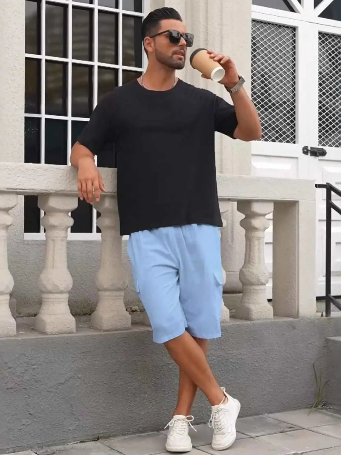 Men's full size drawstring shorts with cargo pockets in light blue, casual style.