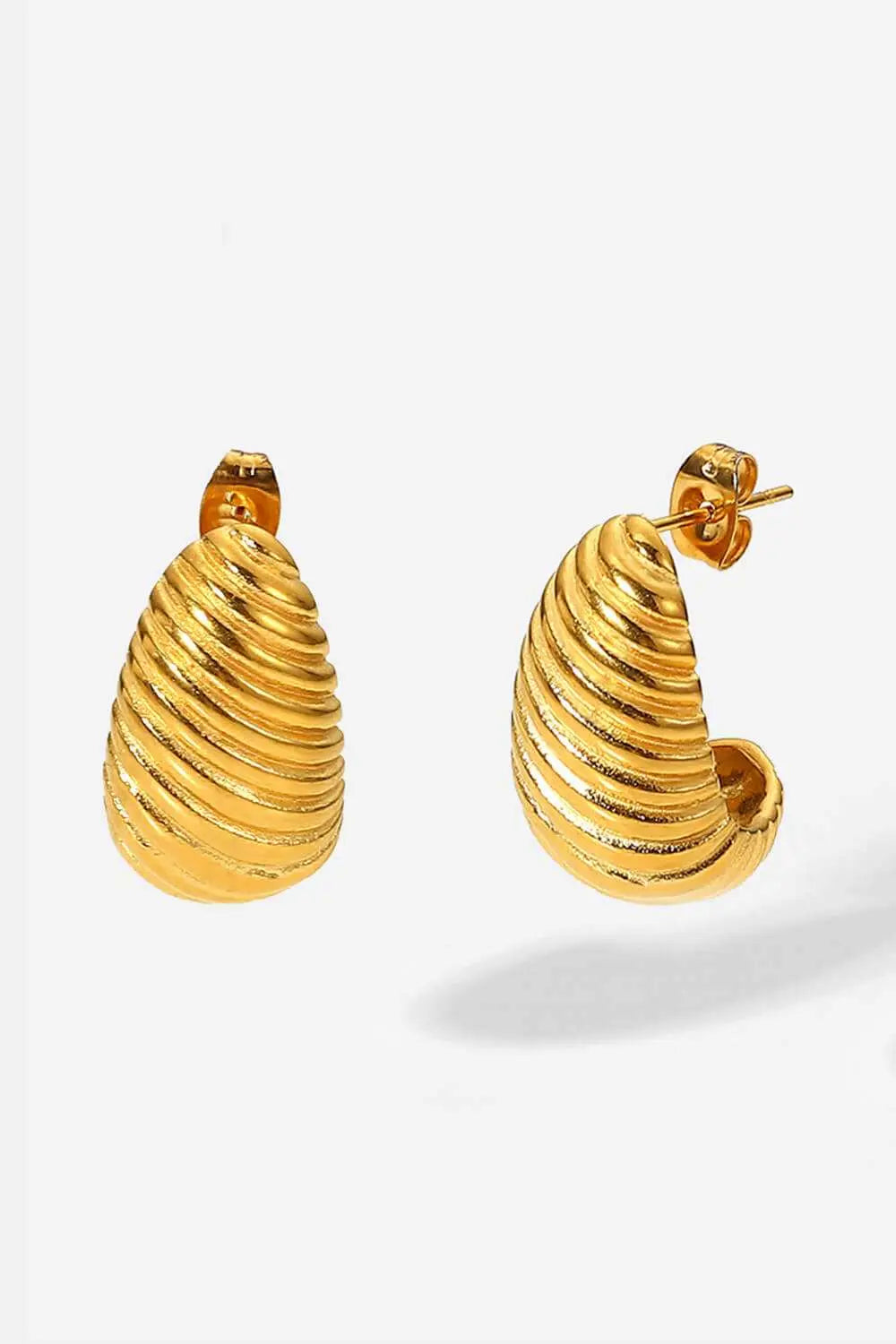 Gold Seashell Stud Earrings with textured spiral design.