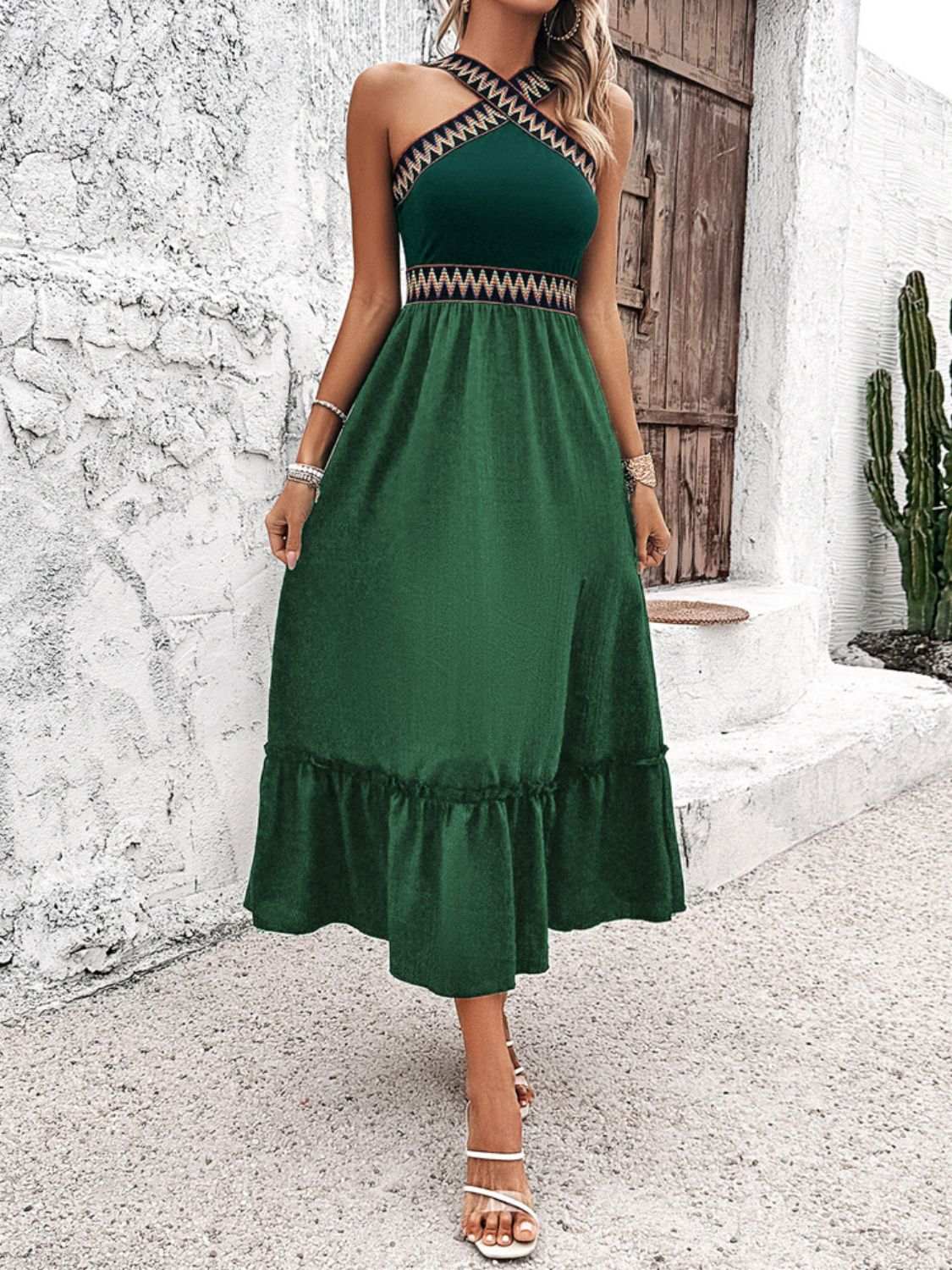 Devine ruffled slit sleeveless midi dress in green with cross neck design.