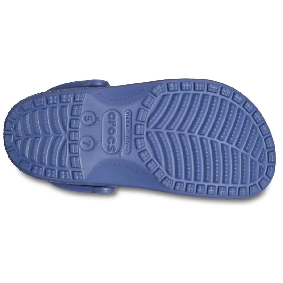 Bottom view of Crocs Unisex-Adult Classic Clogs in blue, featuring textured sole design.