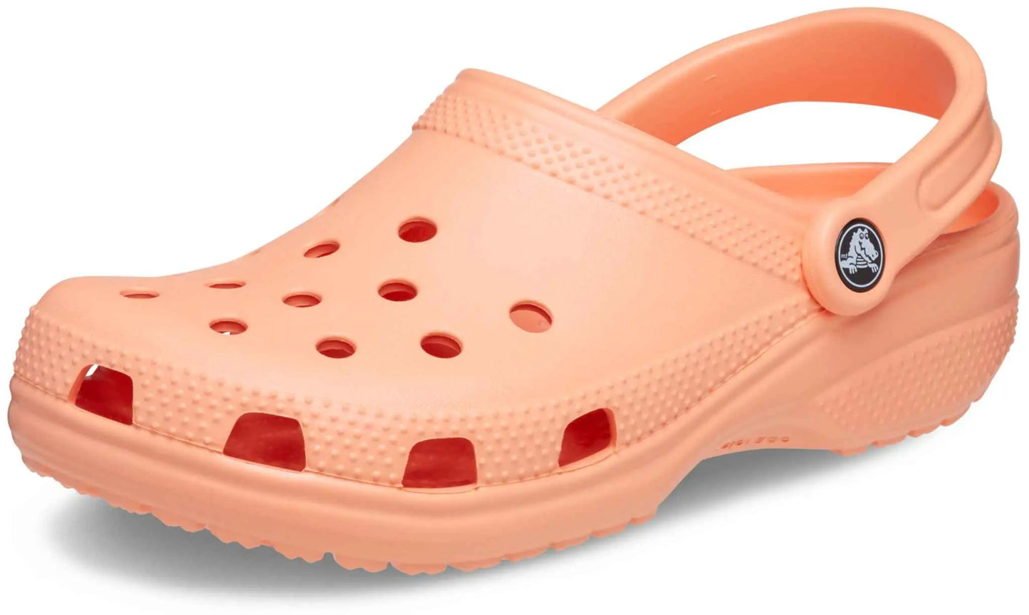 Crocs Unisex-Adult Classic Clogs in orange, lightweight and comfortable with ventilation ports.