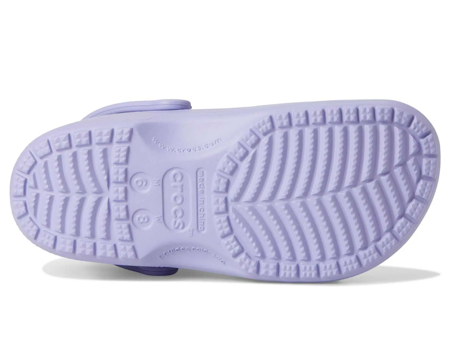 Purple sole of Crocs Unisex-Adult Classic Clogs, featuring iconic comfortable design.