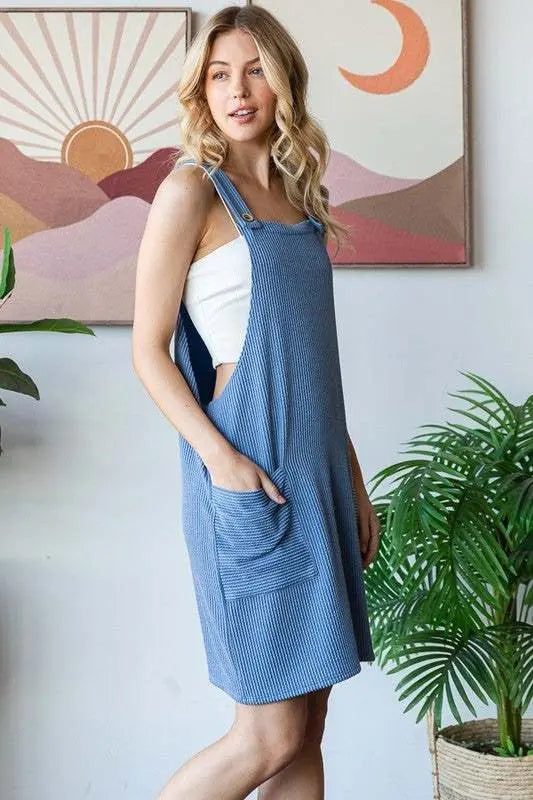 Heimish Full Size Ribbed Sleeveless Mini Tank Dress Plus Size with pockets in blue.