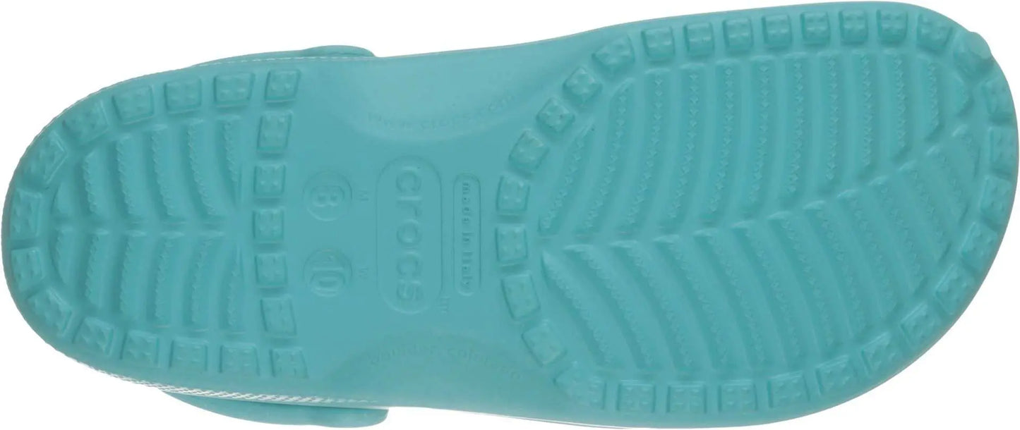 Bottom view of Crocs Unisex-Adult Classic Clog with sole tread pattern in turquoise.