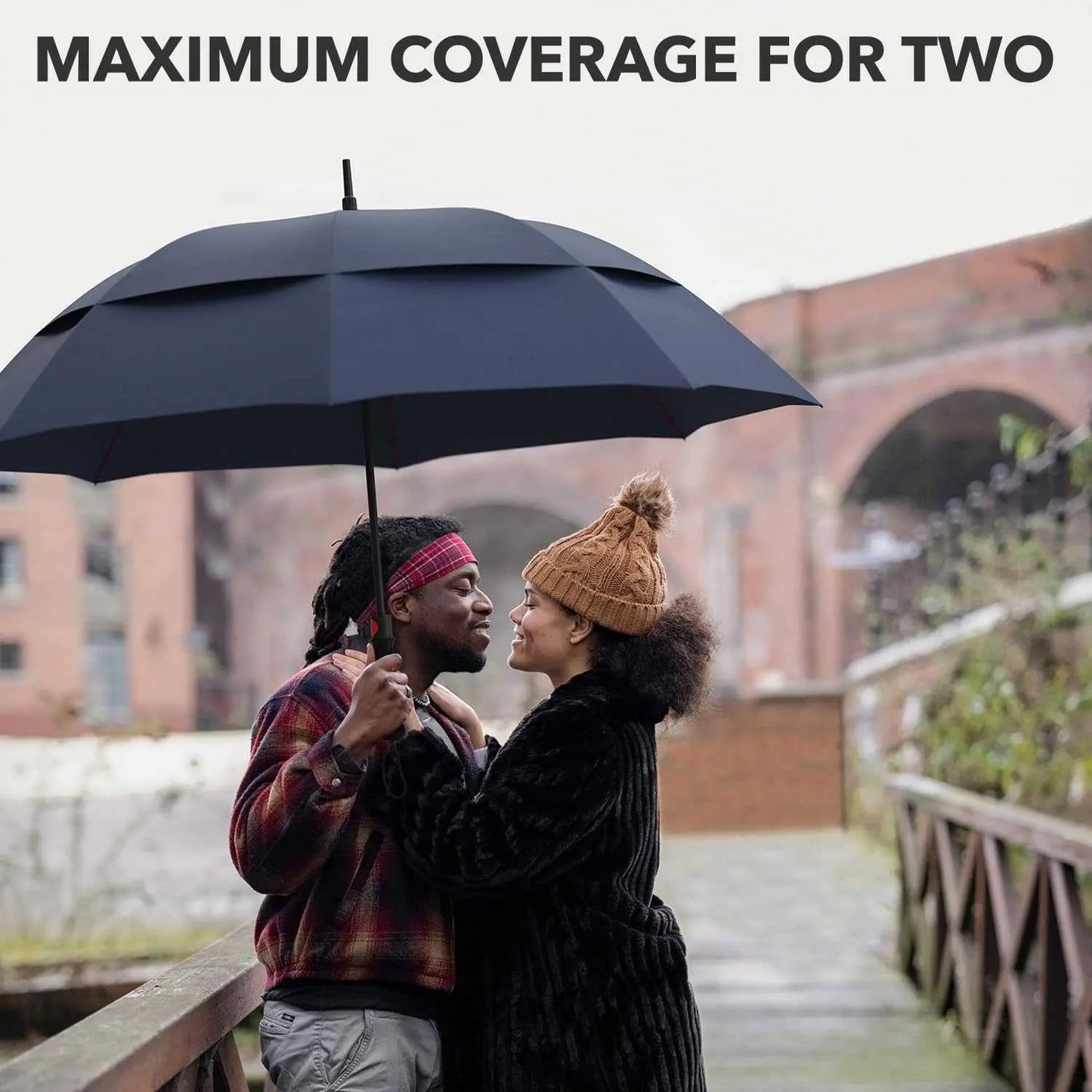 Repel Umbrella Windproof travel umbrella providing maximum coverage for two individuals outdoors.