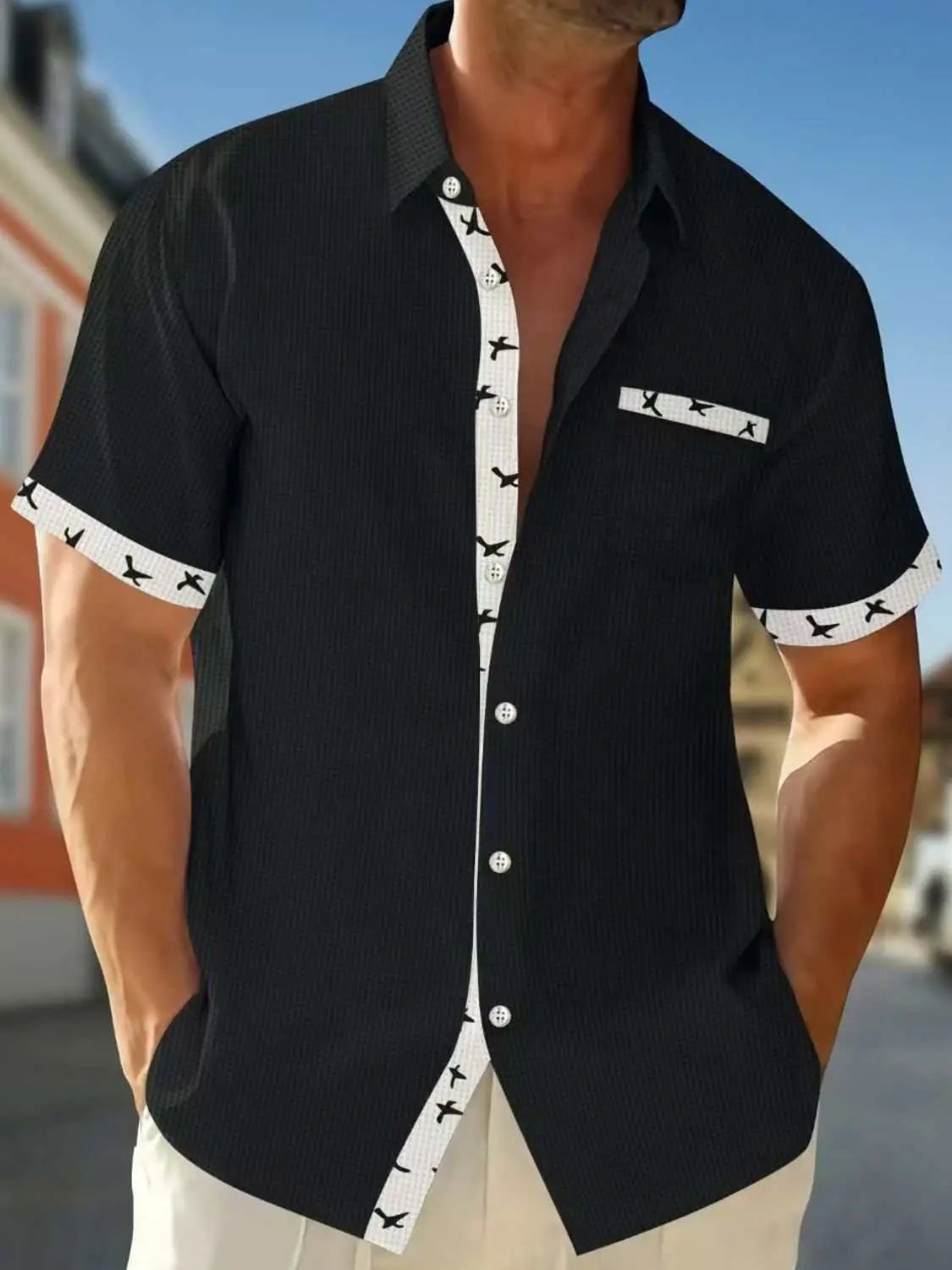 Men's full-size contrast trim waffle knit short sleeve shirt in black.