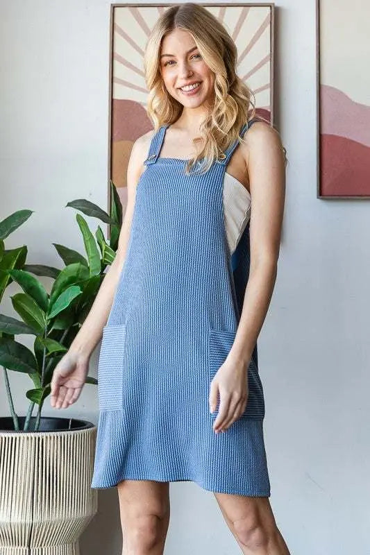 Heimish full size ribbed sleeveless mini tank dress plus size worn by model, showcasing pockets and button details.