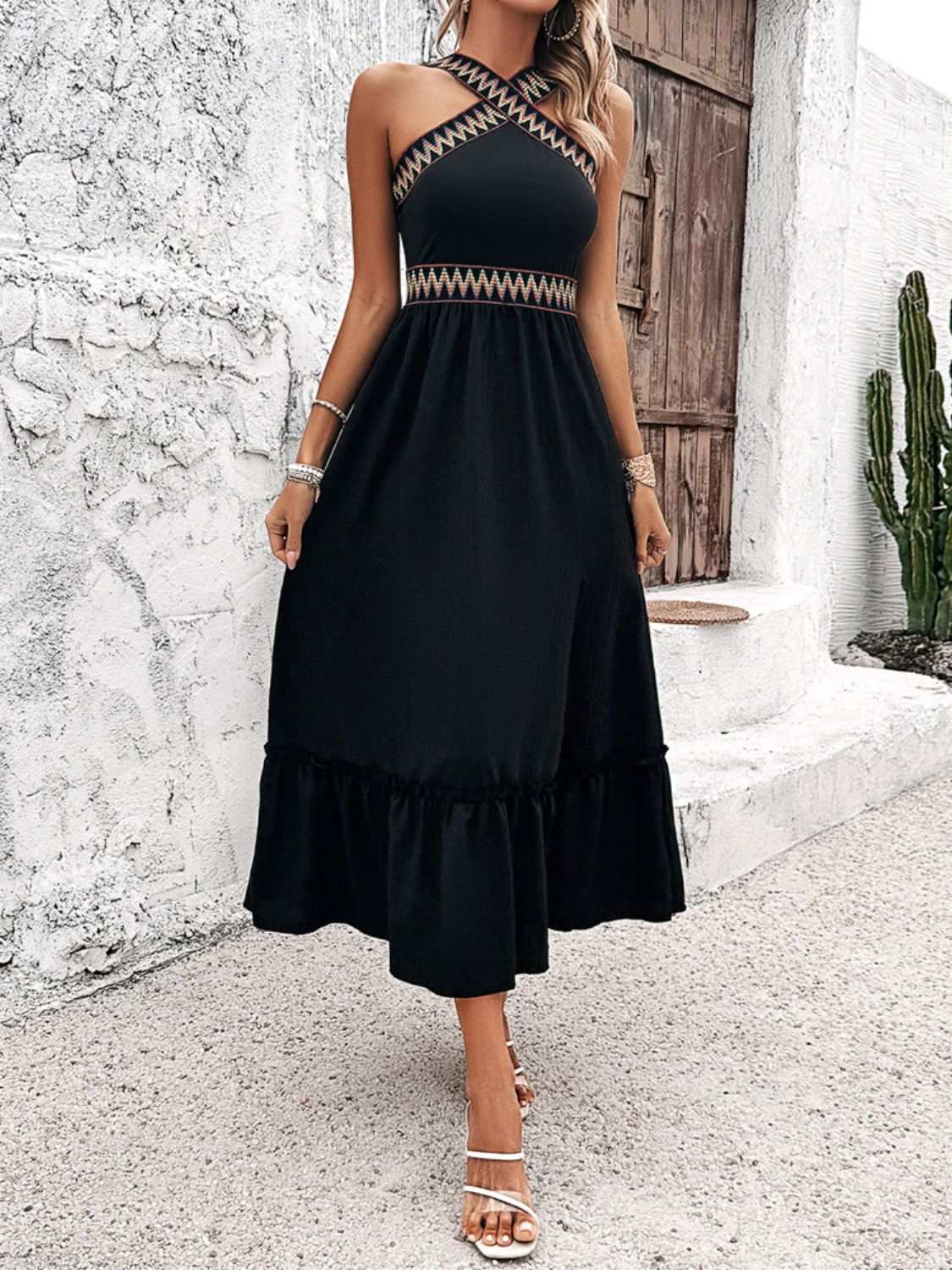 Devine Ruffled Slit Sleeveless Midi Dress in black with stylish ruffles and slit design.