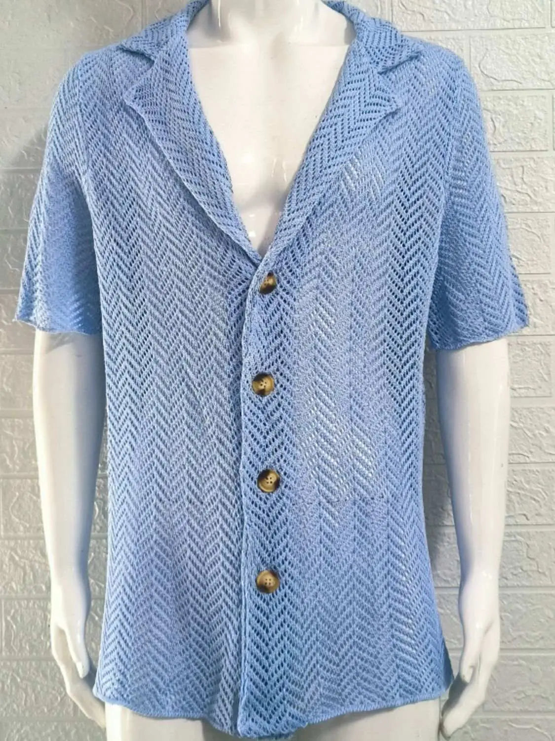 Men's plus size herringbone button down knit shirt with eyelet detail.