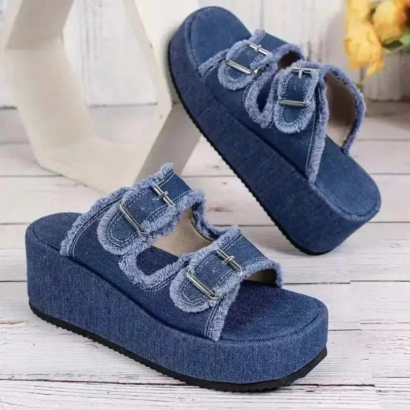 Raw hem wedge buckle sandals with mid heels in blue fabric.