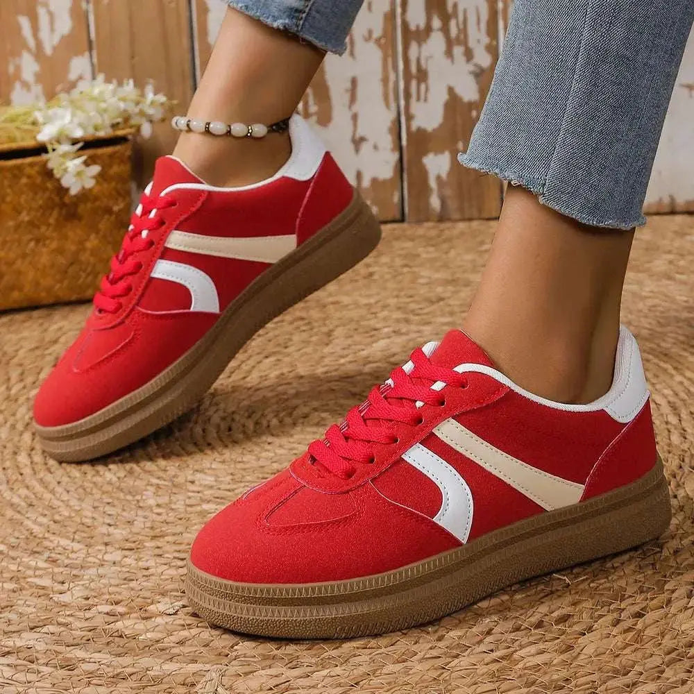 Lace up round toe contrast sneakers in red with white and beige accents, made of PU leather and suede.