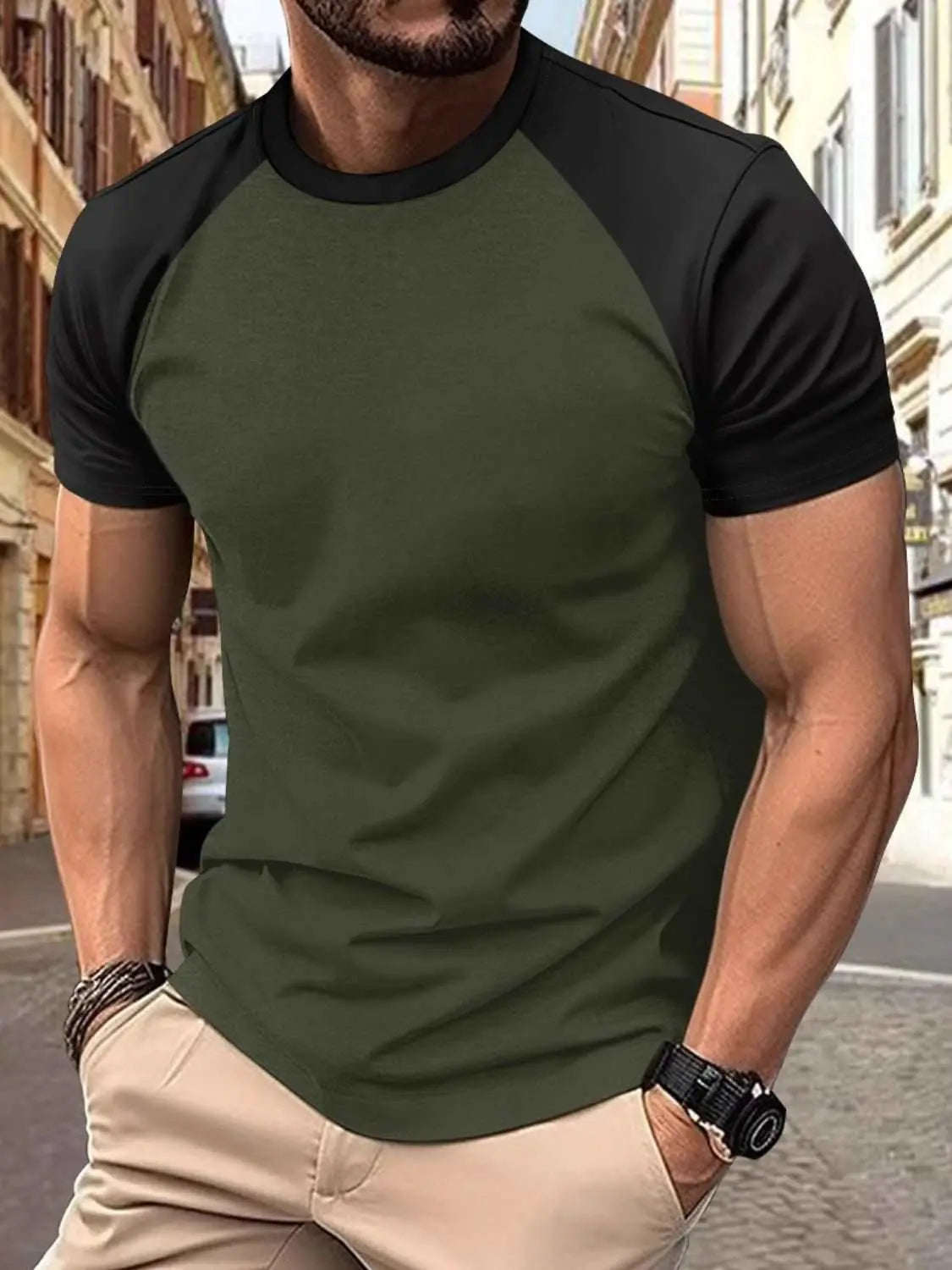 Men's full size round neck contrast T-shirt with short sleeves in green and black.