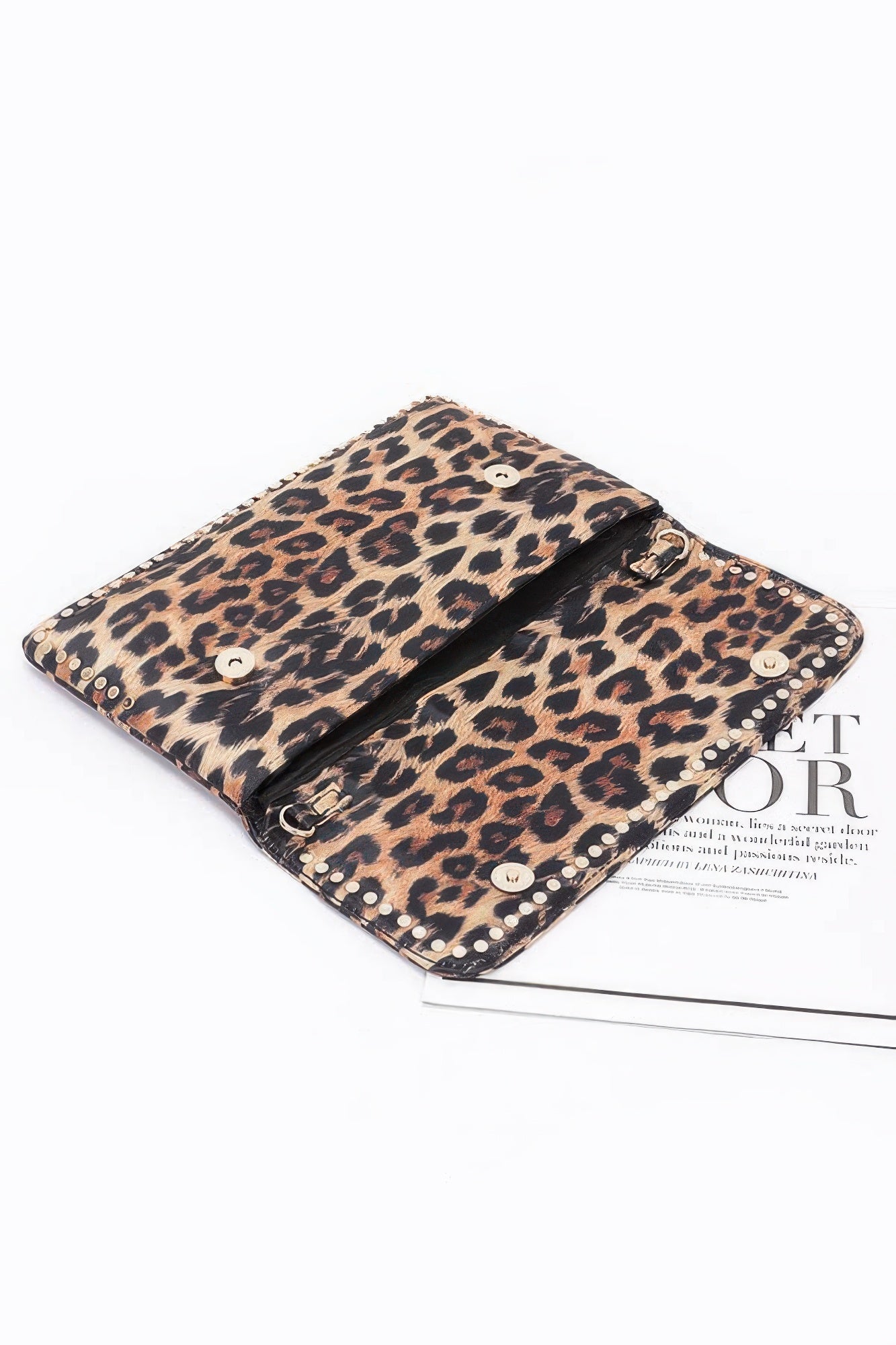 Leopard print clutch bag styled with evening party outfit for women