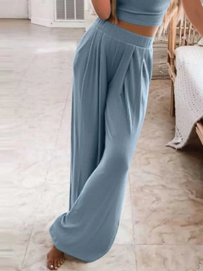 Plus size round neck short sleeve top and pants set in blue, slightly stretchy polyester blend.