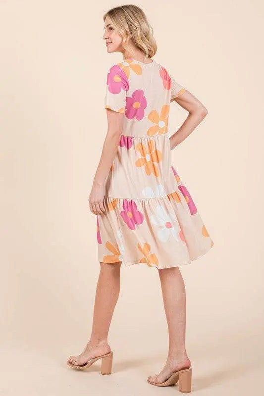 BOMBOM floral round neck short sleeve tiered dress with vibrant print.