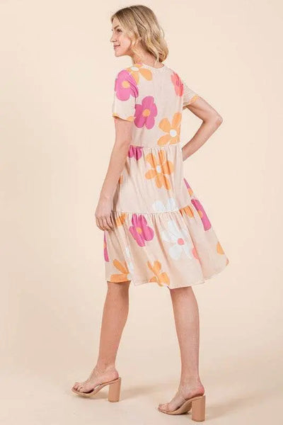 BOMBOM floral round neck short sleeve tiered dress with vibrant print.