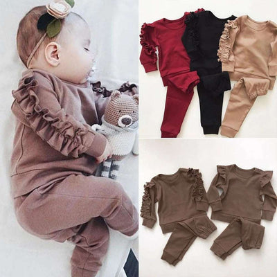 Newborn ruffle jumper 2-piece set with long sleeve top and pants for fall, featuring high-quality cotton material in various colors.