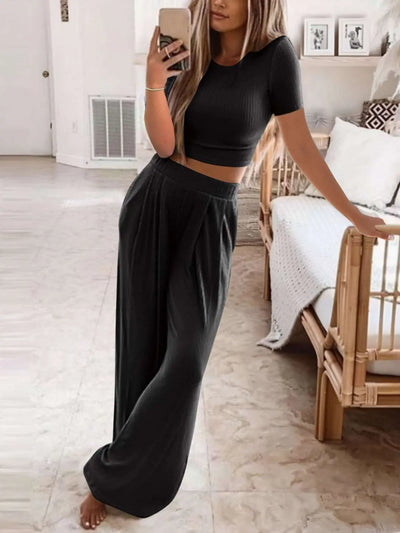 Full size round neck short sleeve top and pants set in plus size.