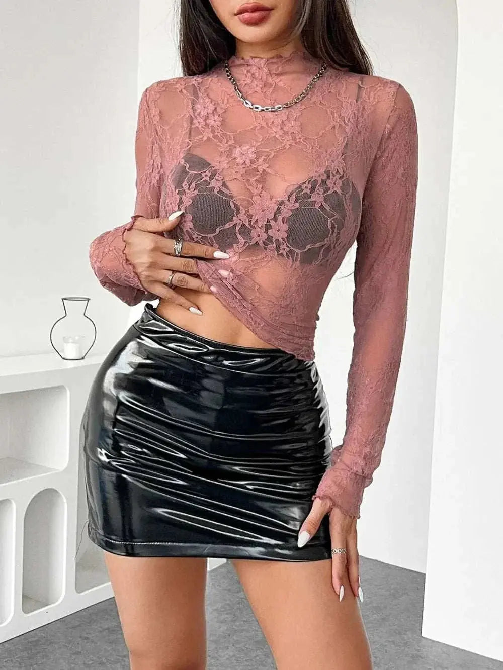 Mock Neck Long Sleeve Sheer Lace Top in pink, slightly stretchy polyester, paired with a black skirt.