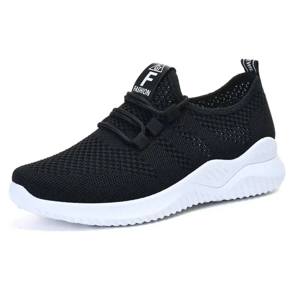 Breathable mesh lace-up athletic shoes in black with white soles.