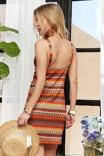 Contrast striped V-neck mini dress in vibrant colors.