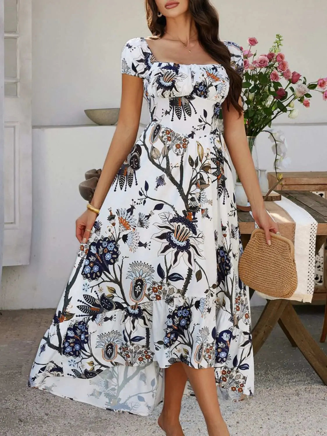 Devine Smocked Printed Short Sleeve Maxi Dress in floral pattern, opaque fabric, feminine silhouette.