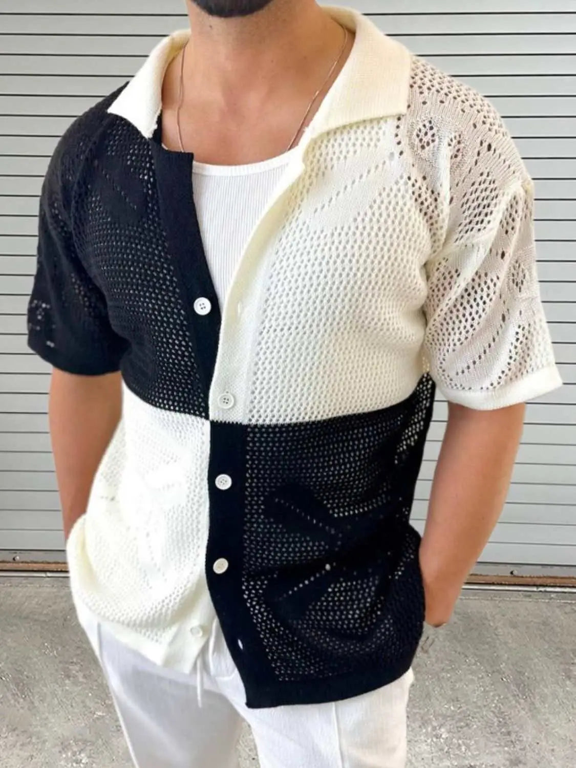 Men's contrast button down hollow out shirt in black and white, slightly stretchy polyester.