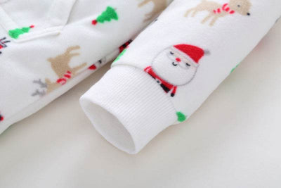 Cozy long-sleeved fleece romper for babies with festive pattern.