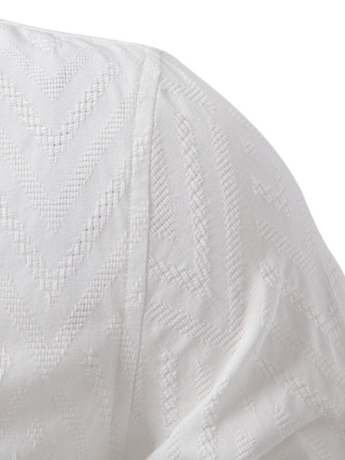 Men's half button geometric textured shirt with collared neck, slightly stretchy fabric.