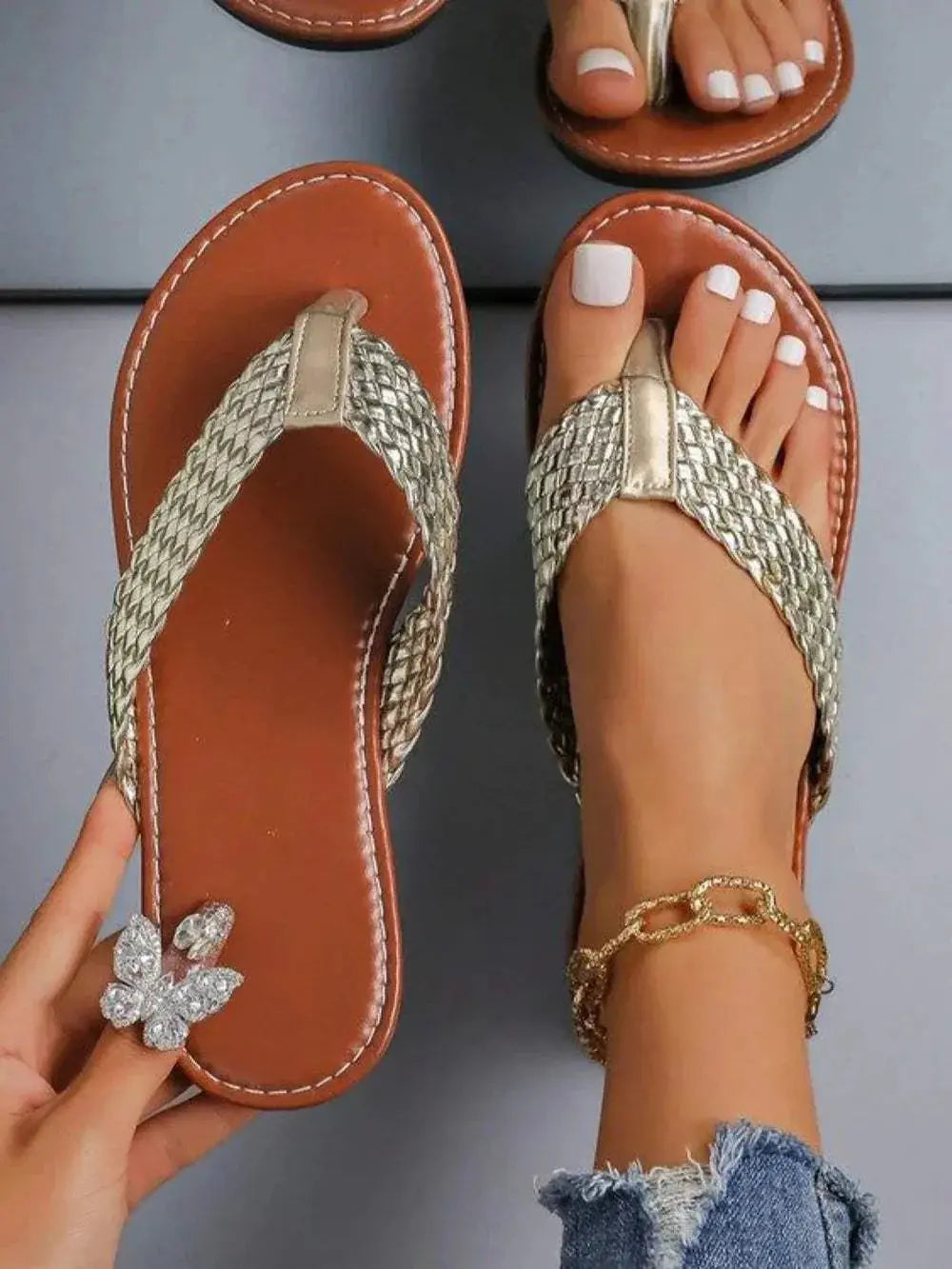 Braided toe post flats sandals with rubber and PU material.