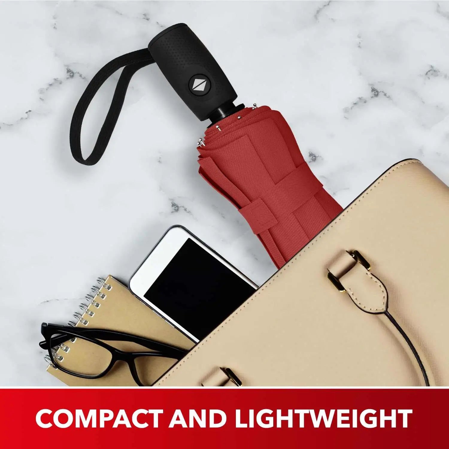 Compact Repel Umbrella Windproof, red, fits in purse with phone and notebook.