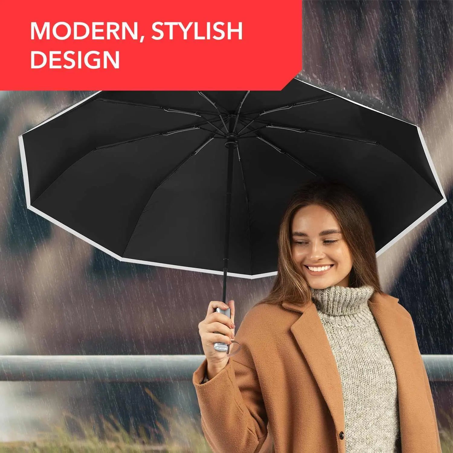 Modern stylish woman holding black Repel umbrella, windproof travel accessory with an auto open/close feature.