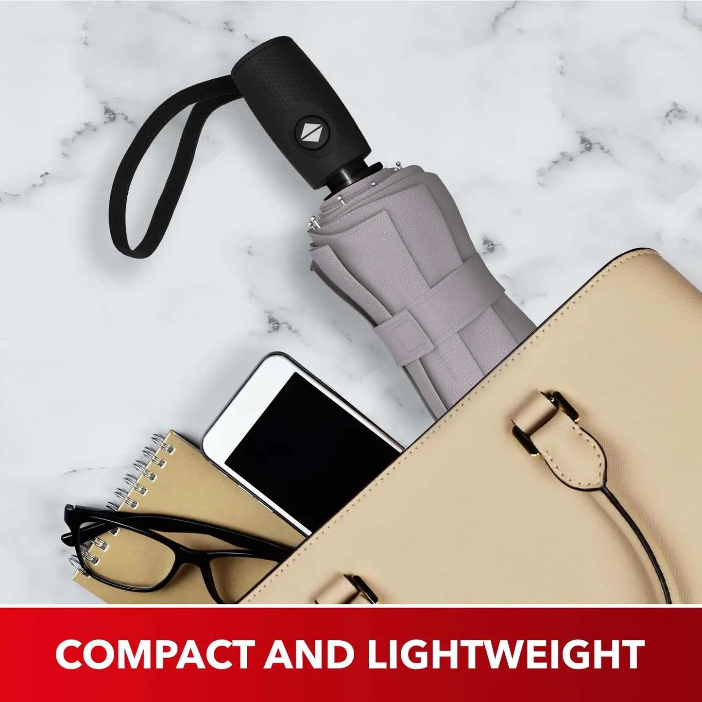 Compact and lightweight Repel Umbrella Windproof nestled in a beige bag, highlighting portability and durability.