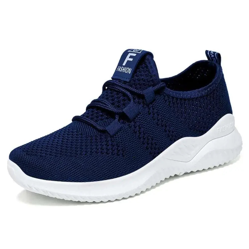 Breathable mesh lace-up athletic shoe in navy, featuring a flat heel and rubber sole.