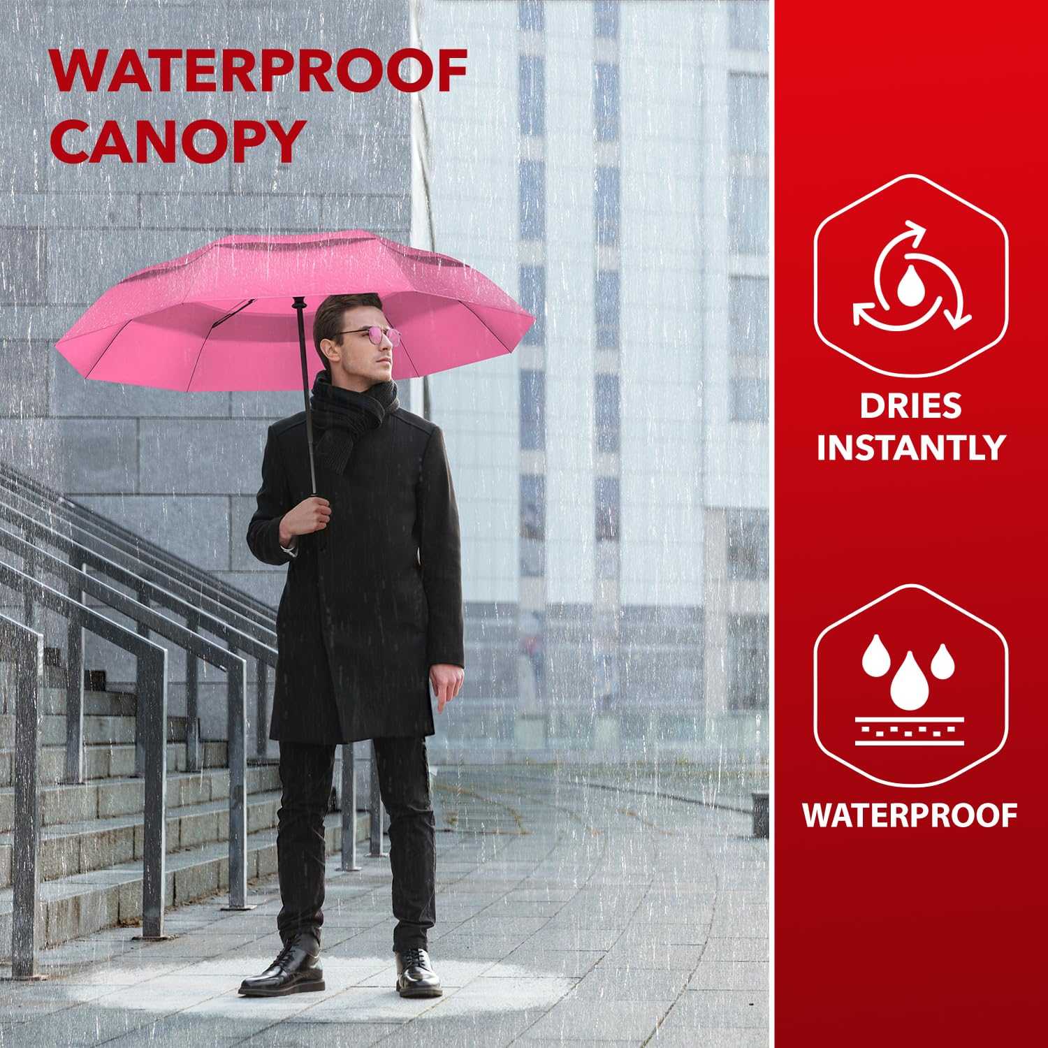 Man using a pink Repel Umbrella Windproof with waterproof canopy in the rain.