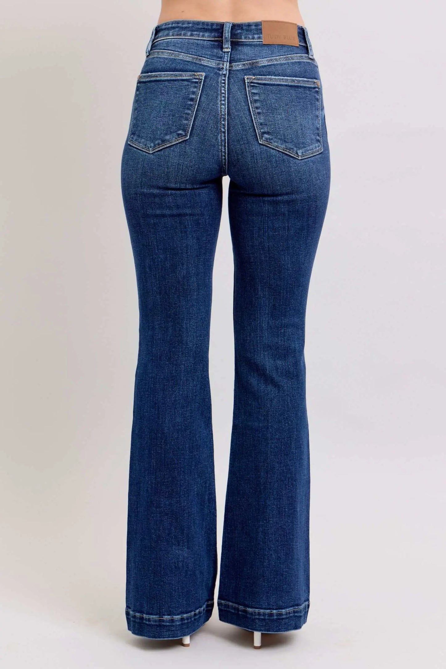 Judy Blue Full Size High Rise Flare Jeans with Pockets Plus Size, featuring a flattering high-waisted silhouette and retro flare leg.
