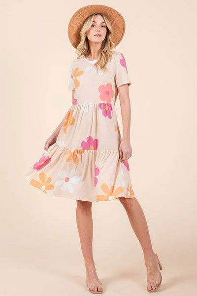 BOMBOM floral round neck short sleeve tiered dress with a chic silhouette.