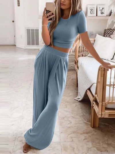 Plus size blue round neck short sleeve top and pants set.
