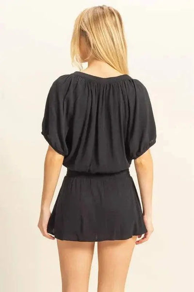 Drawstring hem short sleeve top and skort set in black, trendy casual outfit.