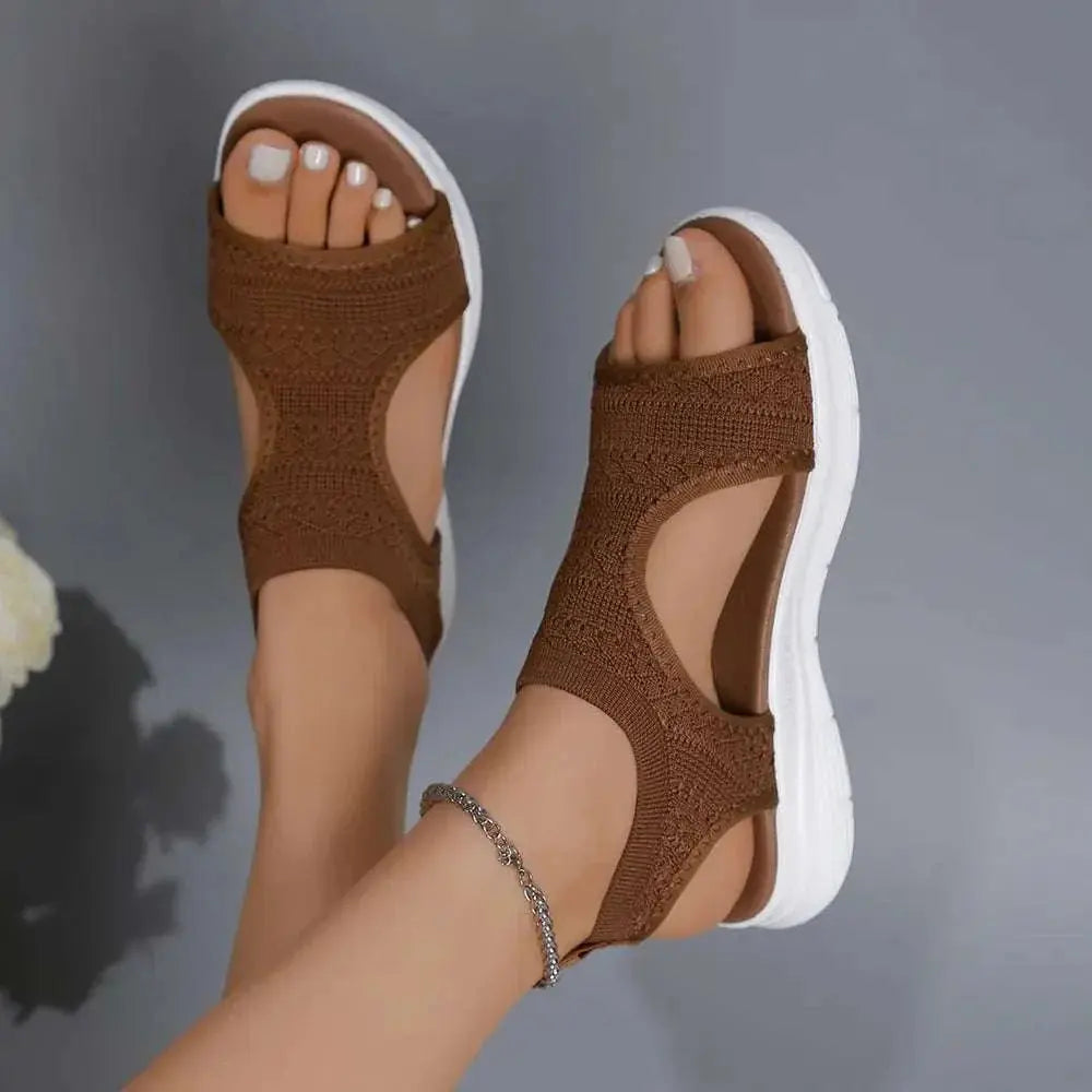 Peep toe solid color sandals in brown, rubber cloth material, flat heel.