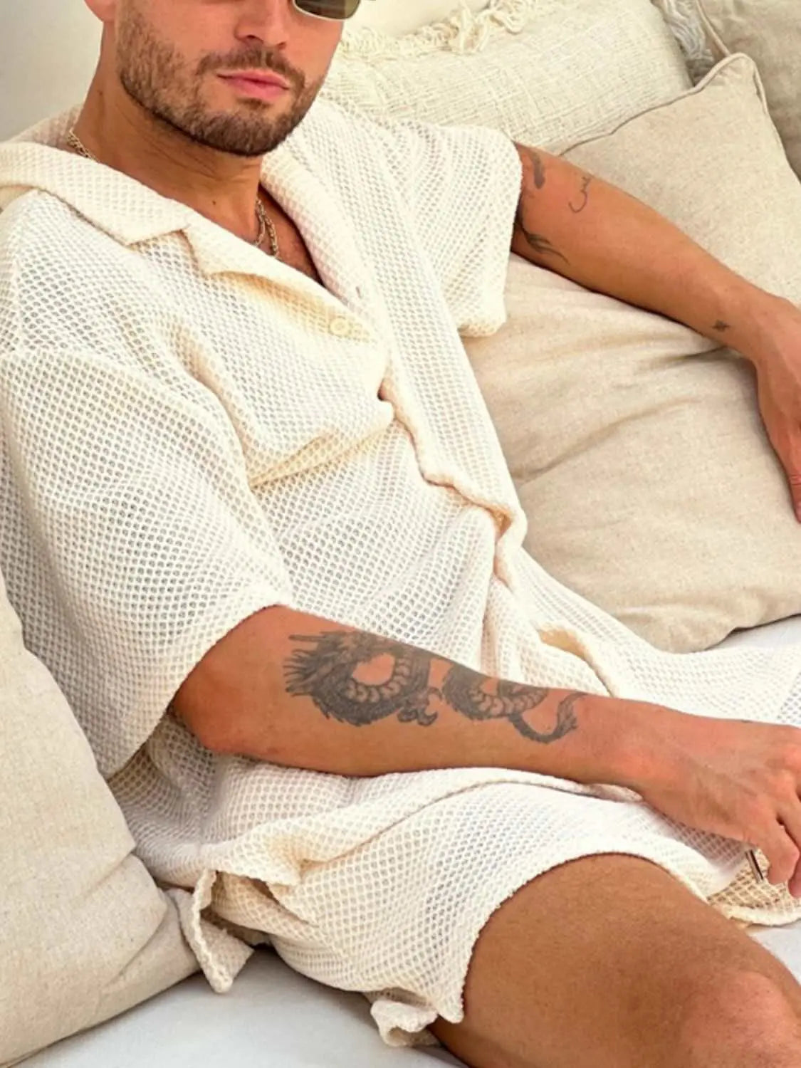 Men's plus size button-down half sleeve top and shorts set in a lightweight, slightly stretchy fabric.